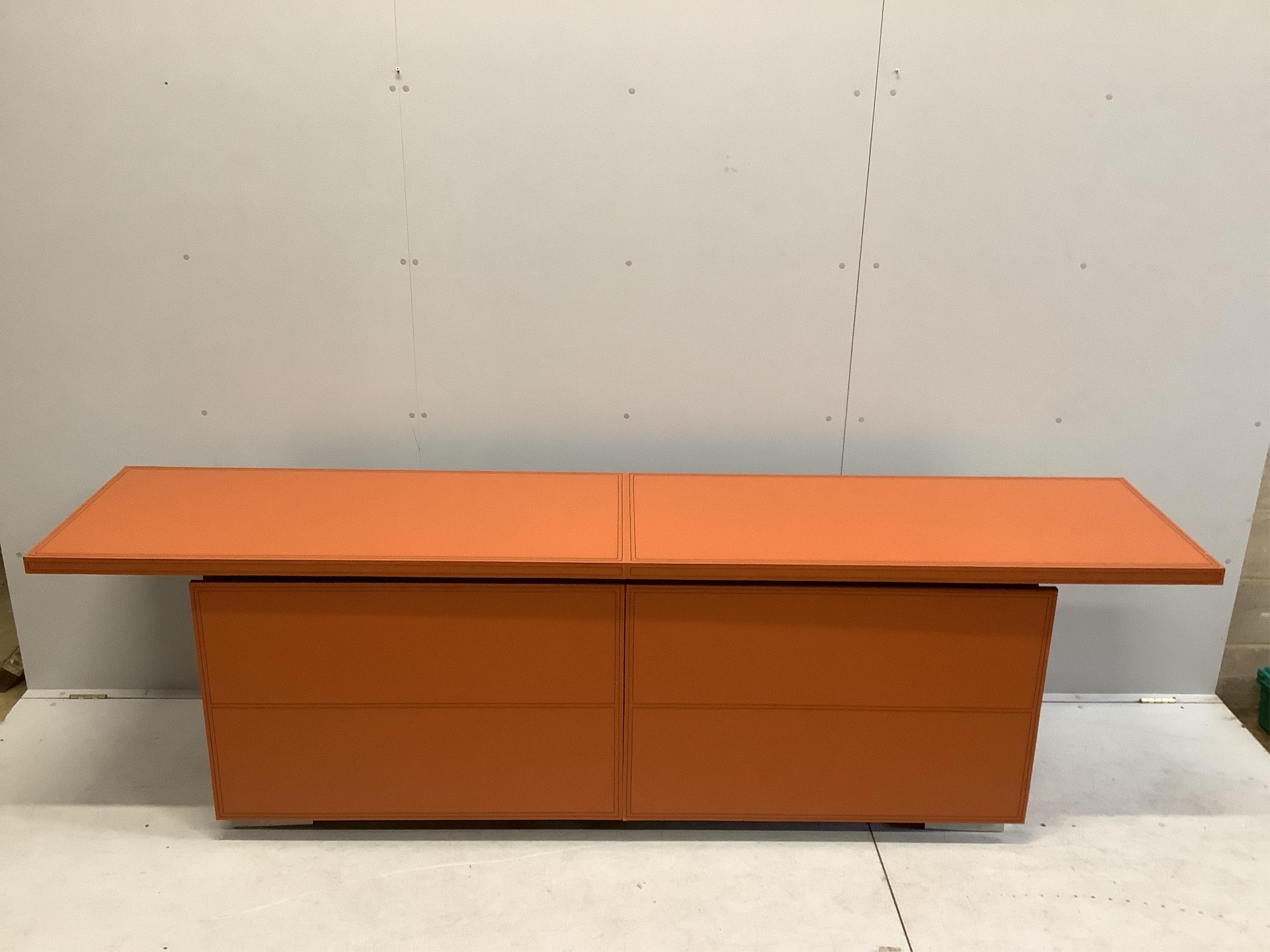 A Contemporary tan leather ‘Red Bull’ sideboard, width 270cm, depth 57cm, height 78cm. Condition - fair